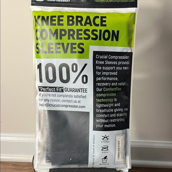 Crucial Black and White Knee Brace with Power Support - Picture 4 of 4